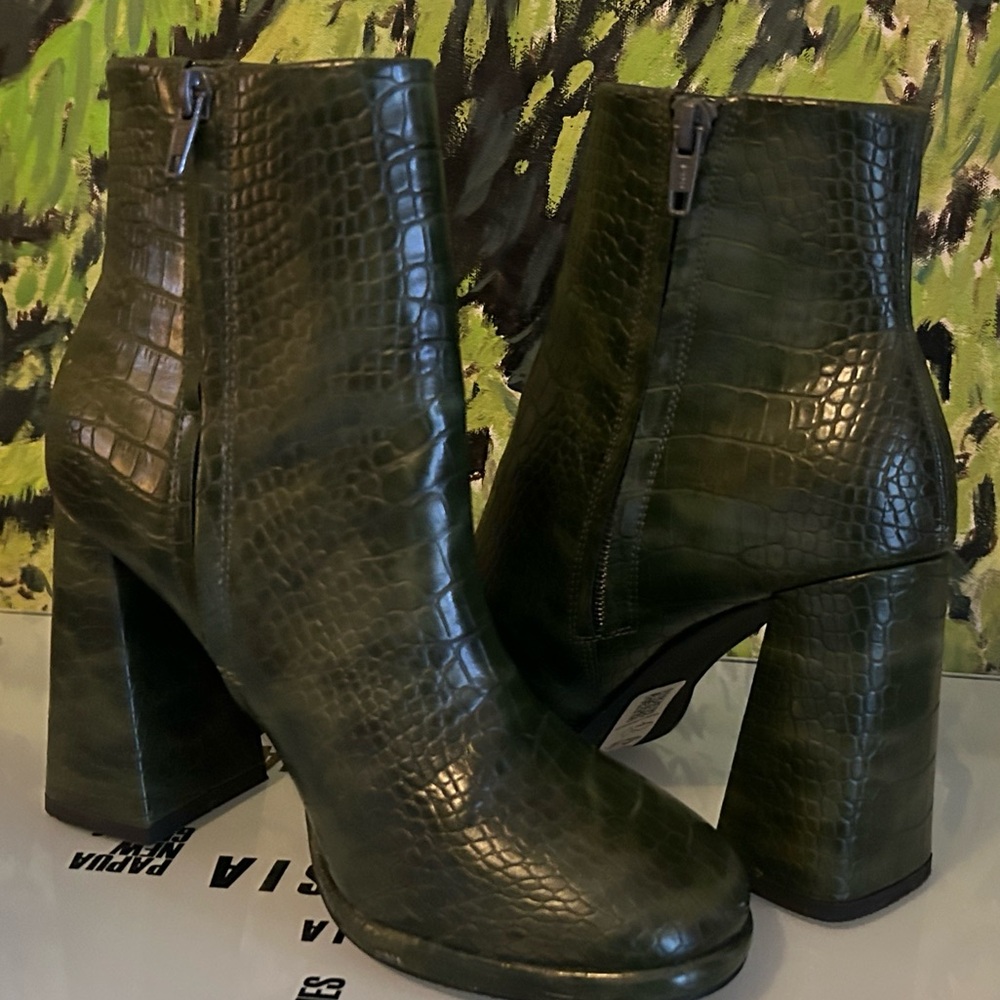 Dark green crocodile boots